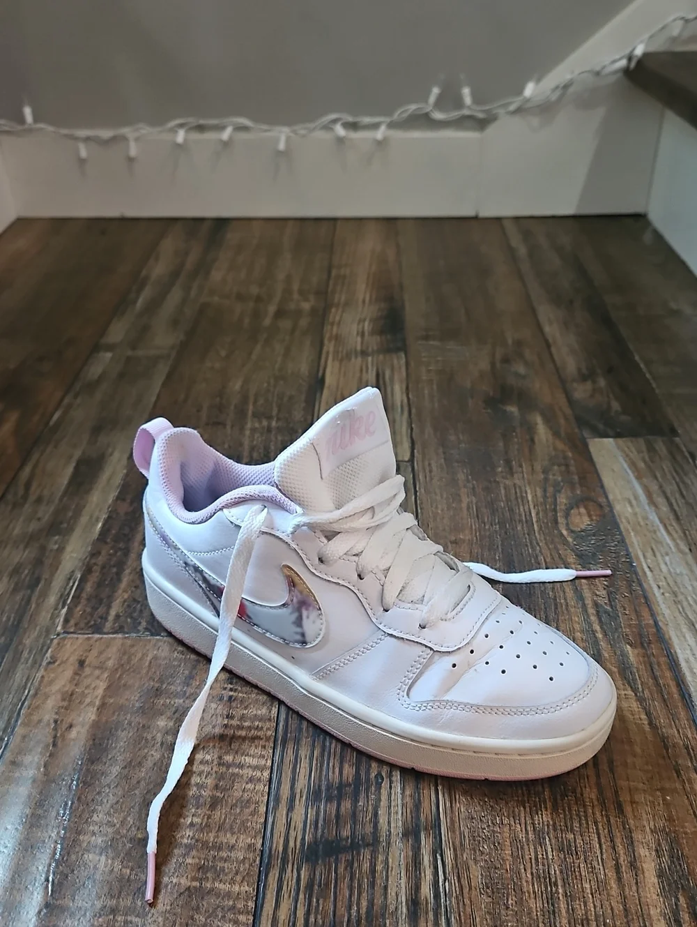 Nike White Low-Top Sneakers with Marbled Swoosh and Pink Details